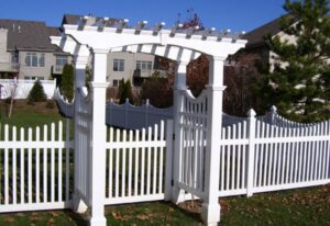 White fence in front of home 