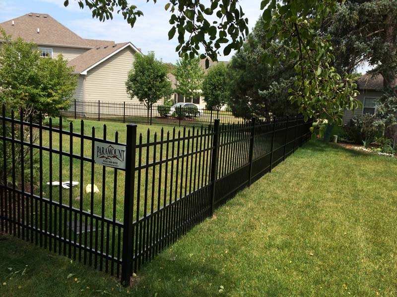 Black aluminium picket fence for puppy installed by Paramount Fence in Batavia, IL
