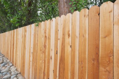 New wooden privacy fence installed in residential backyard in Chicago, IL